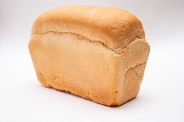 Fresh Baked loaf of bread isolated on white background.
