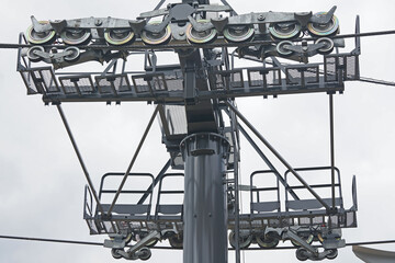 Many pulleys attached to cable car poles