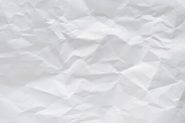 White crumpled paper texture background.