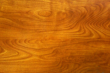 The texture of the brown wood.