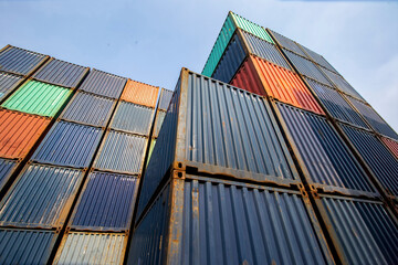 Row of Stacking Containers of Freight Import/Export Distribution Warehouse. Shipping Logistics Transport Industrial, container box in warehouse in shipping port.