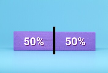 The group of people is divided equally by line. Visualization of statistical data. 50% of 100%