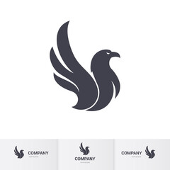 Simple Dark Eagle Icon for Mascot Logo Template on White. Bird Silhouette Logo. Abstract Minimalistic illustration Flying Fowl