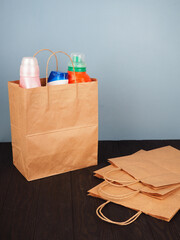 Craft bag with cans and bottles for cleaning the house, household bag with household chemicals