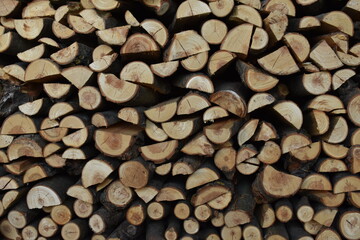 stack of firewood,chopped firewood, pieces of wood, timber, for burning in a stove, fireplace
