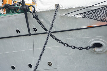 Chains and anchors on the bows of sailing ships anchored in Japanese ports