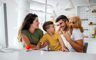 Young happy family having fun, being playful at home