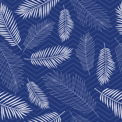 Seamless tropics background. Tropical leaves on a background of zigzag lines in blue. Vector illustration for design and web.
