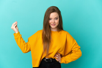 Teenager girl over isolated blue background making Italian gesture