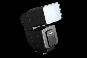 Camera external flash speedlight isolated on black background.