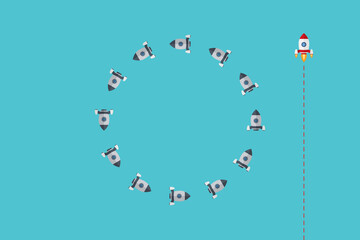 Different Approach - Different Direction. Group of rockets flying in one direction and with one individual flying in the different way, can be used leadership/individuality concepts.	
