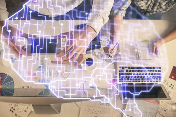 Double exposure of man and woman working together and human brain hologram drawing. Brainstorm concept. Computer background. Top View.