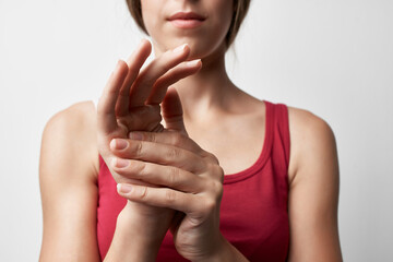 woman with joint pain in fingers arthritis rheumatism