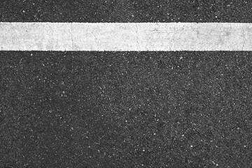 Fototapeta premium Surface grunge rough of asphalt, Seamless tarmac dark grey with white line on the road and small rock, Texture Background, Top view