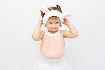 Obraz na płótnie Canvas Funny little bunny girl on a white background.