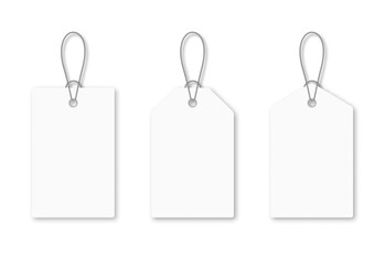 Set of blank white tags with rope. White shopping labels and price tags in different shapes. Mockup and template of paper price tag