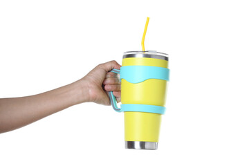 Hand holding stainless steel thermos mug on white background