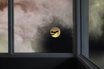 Full moon with smoke in terrific night in the window
