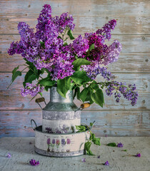 Beautiful bouquet of freshly cut and fragrant lilac branches.