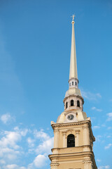 Spire of Peter and Paul Cathedral on a background of blue sky.