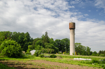 Fototapeta na wymiar Water tower in Varme village, Latvia.