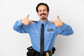 Young police man over isolated background white proud and self-satisfied