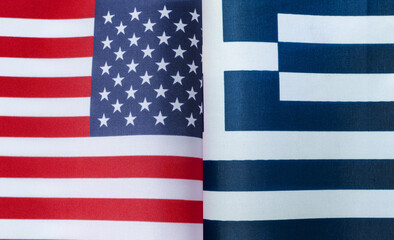 Fototapeta premium fragments of the national flags of the United States and Greece in close-up