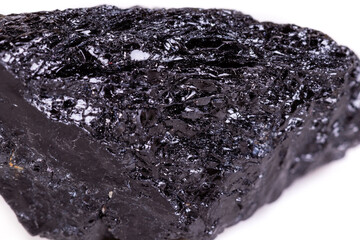 Macro mineral stone sorrel - black tourmaline on white background