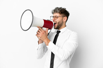 Business caucasian man isolated on white background shouting through a megaphone