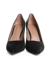 Pair of elegant black high heel shoes on white background