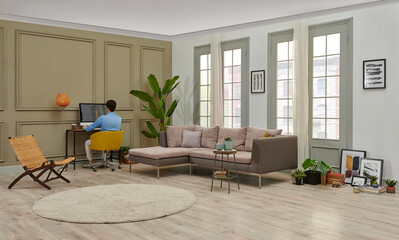 Man is working from home, table computer style, decorative living room.