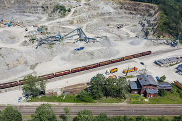 The Gneiss Mine, opencast mine in the countryside in Poland. Mine in a villae from drone aerial...