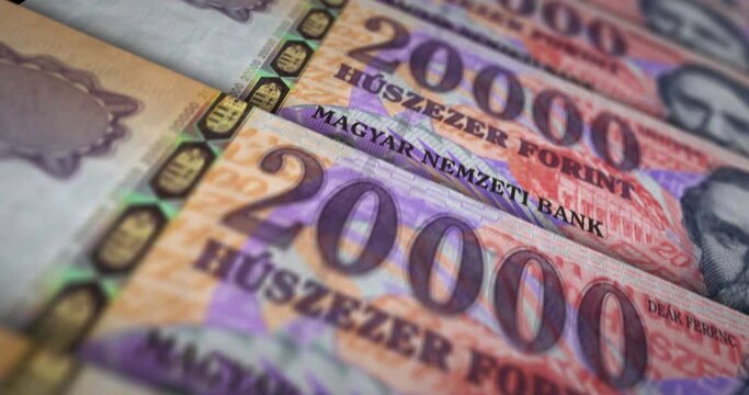 Hungarian Forint banknote loop. HUF money texture. Concept of economy, business, crisis, banking, recession, debt and finance in Hungary. Moving over note. Loopable seamless 3d animation.