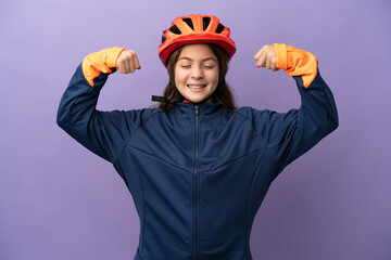 Little caucasian girl isolated on purple background doing strong gesture