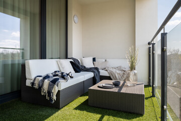 Nice balcony with rattan furniture - obrazy, fototapety, plakaty