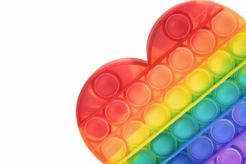 Colorful Antistress Pop it toy. Rainbow sensory fidget isolated on white background, with hard shadows. New trendy silicone toy. Toy for the development of fine motor skills of the fingers. Border.