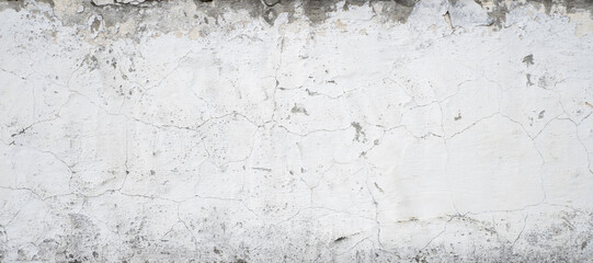 Old grungy grey concrete wall as a texture.