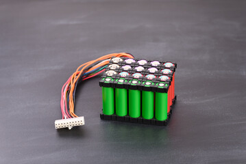 Lithium battery pack on dark background.
