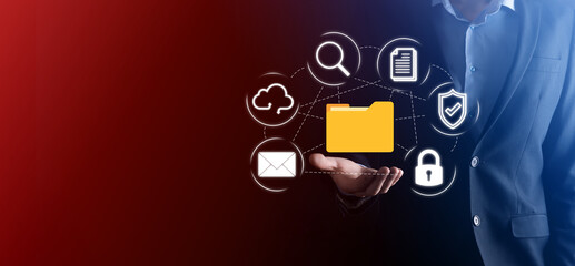 Document Management System DMS .Businessman hold folder and document icon.Software for archiving, searching and managing corporate files and information.Internet Technology Concept.Digital security