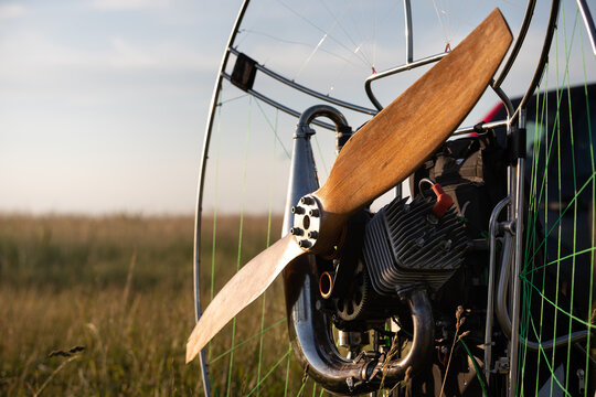 Preparing a paralet with a gasoline engine for flights. Paragliding machine for individual paragliding flights. Wing flight preparation. Extreme sports.