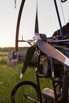 Preparing a paralet with a gasoline engine for flights. Paragliding machine for individual paragliding flights. Wing flight preparation. Extreme sports.