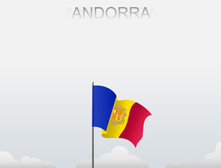 Andorra flag flutters on a pole standing tall under a white sky