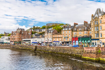 A view along the seafront in the town of Oban, Scotland on a summers evening