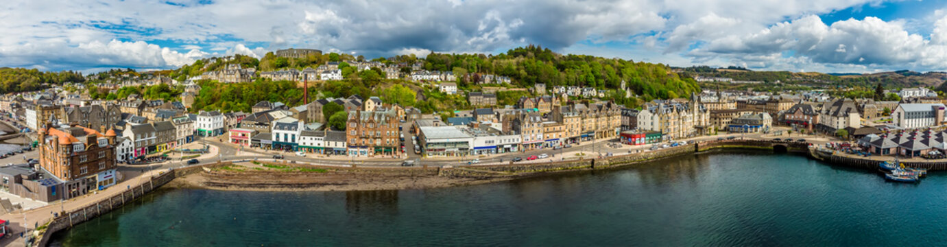 A panorama aerial view across the seafront in the town of Oban, Scotland on a summers day