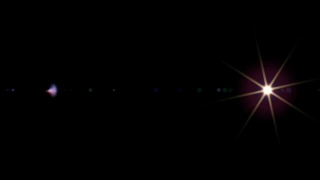 A glowing light passing the screen left to right. Lens flare flash moving on black background in UHD 4k animation