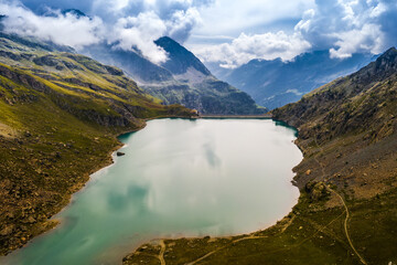 Aerial view of dam in inspiring alpine mountains