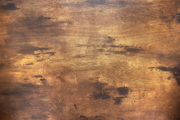 Background of dark brown and yellow textural wooden board, copy space 