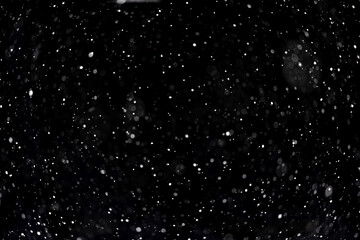 Falling white snow on black background layer for overlay
