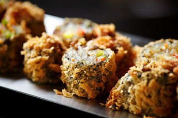 Fried vegetable rolls on a plate 