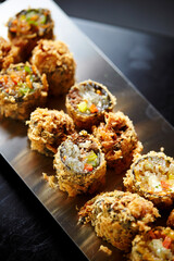 Fried vegetable rolls on a plate 